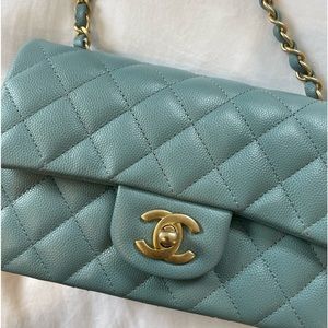 Stunning Chanel Mini Rectangle in caviar leather with matte gold hardware.